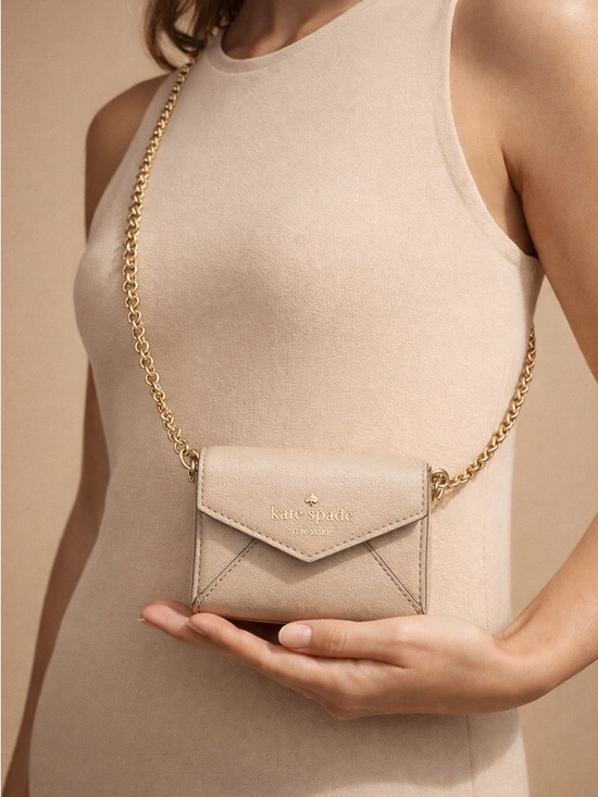 kate spade Handbags - kate spade beige leather envelope crossbody with gold chain